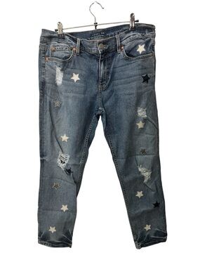 Level 99 women’s embroidered star distressed blue jeans size 30
